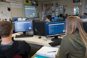 Students working with TEALS volunteer via Skype